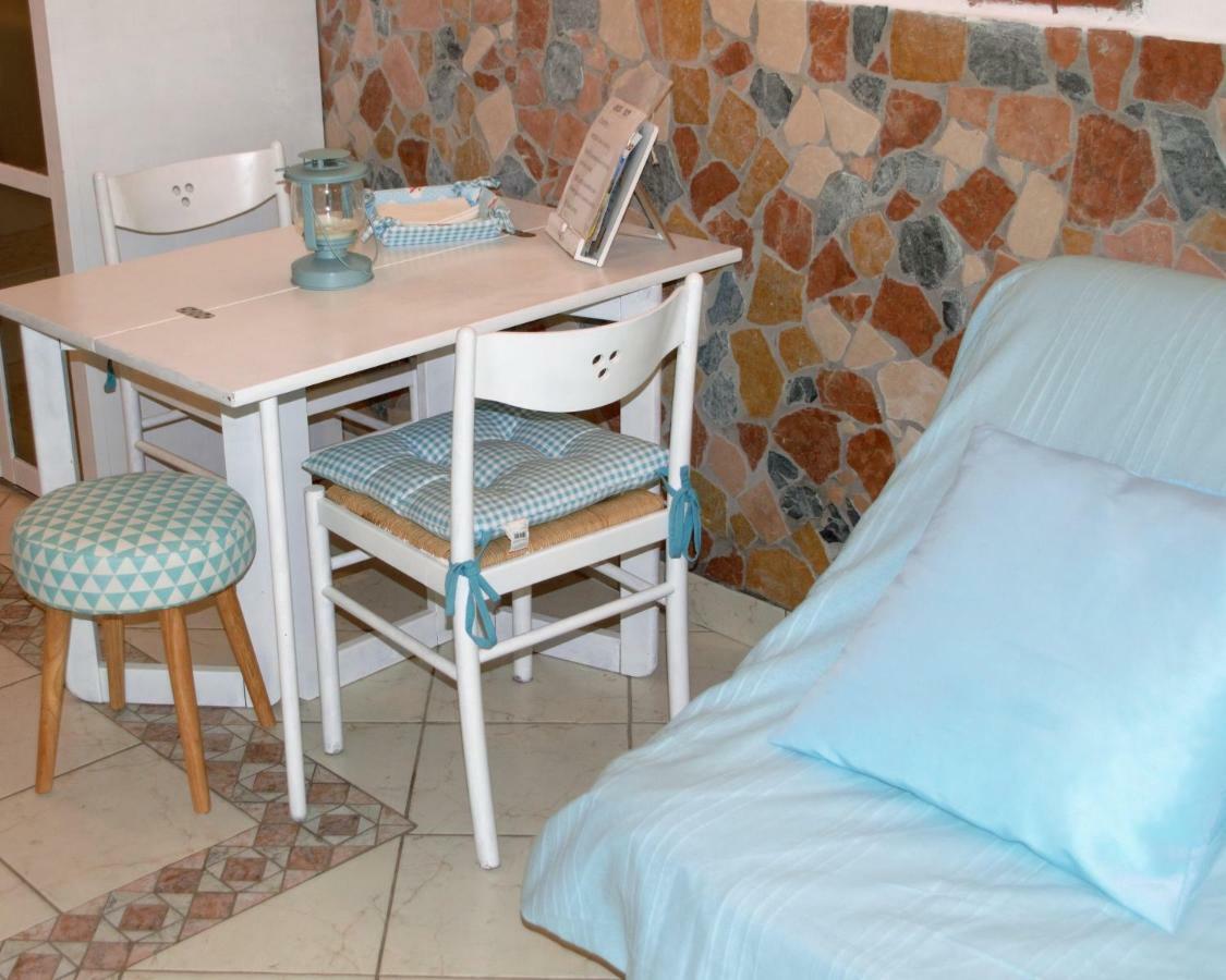 Appartamento La Maison กาโปลิเวรี ภายนอก รูปภาพ